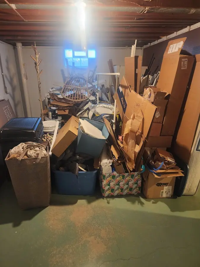 Roll-off dumpster container at job site for 4 Yard Dumpster Rental in Ray